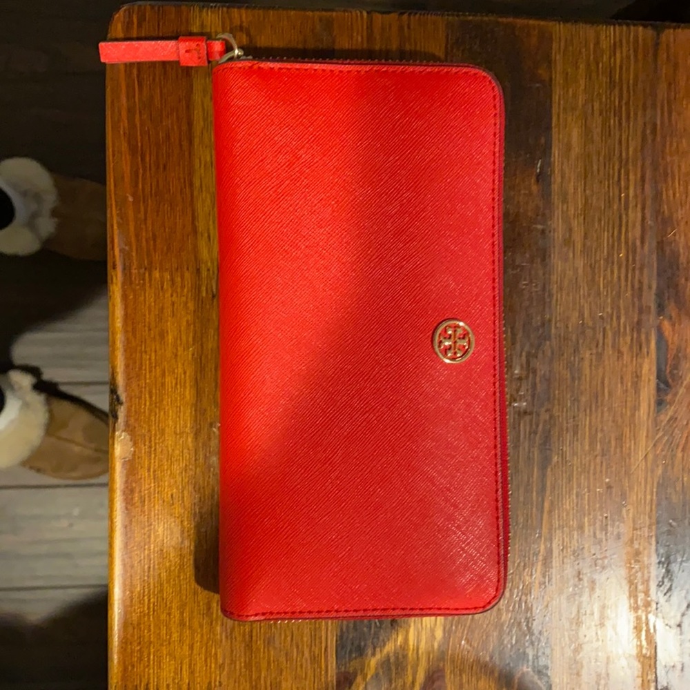 Selling a new never used red wallet with no tags